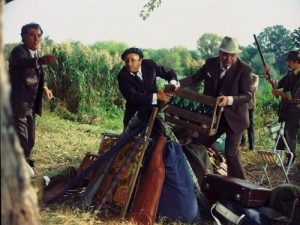 Octavian Cotescu (Eugen), penultimul din stânga, alături de Toma Caragiu, Marin Moraru și Ovidiu Schumaher în Operațiunea „Monstrul” în regia lui Manole Marcus. Casa de Filme Trei, 1975. © All about Romanian Cinema (AaRC), Revistă online editată de Uniunea Cineaștilor din România, Url: http://aarc.ro/cineasti/cineast/2979